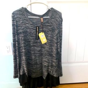 Sweater with black sheer bottom.